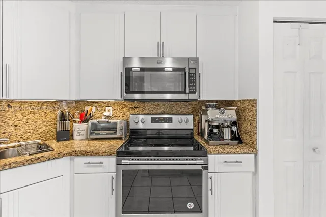a view of a storage & utility room with a window