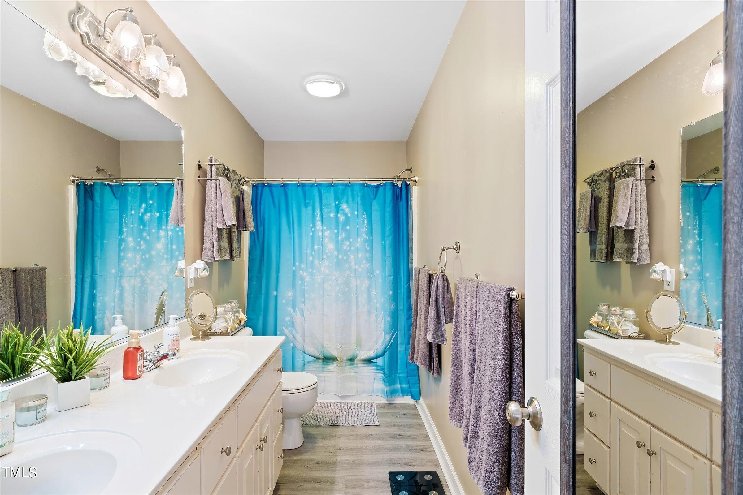 21 Birchwood Circle Coats, NC 27521 - Photo 20 of 36 a spacious bathroom with a tub and shower