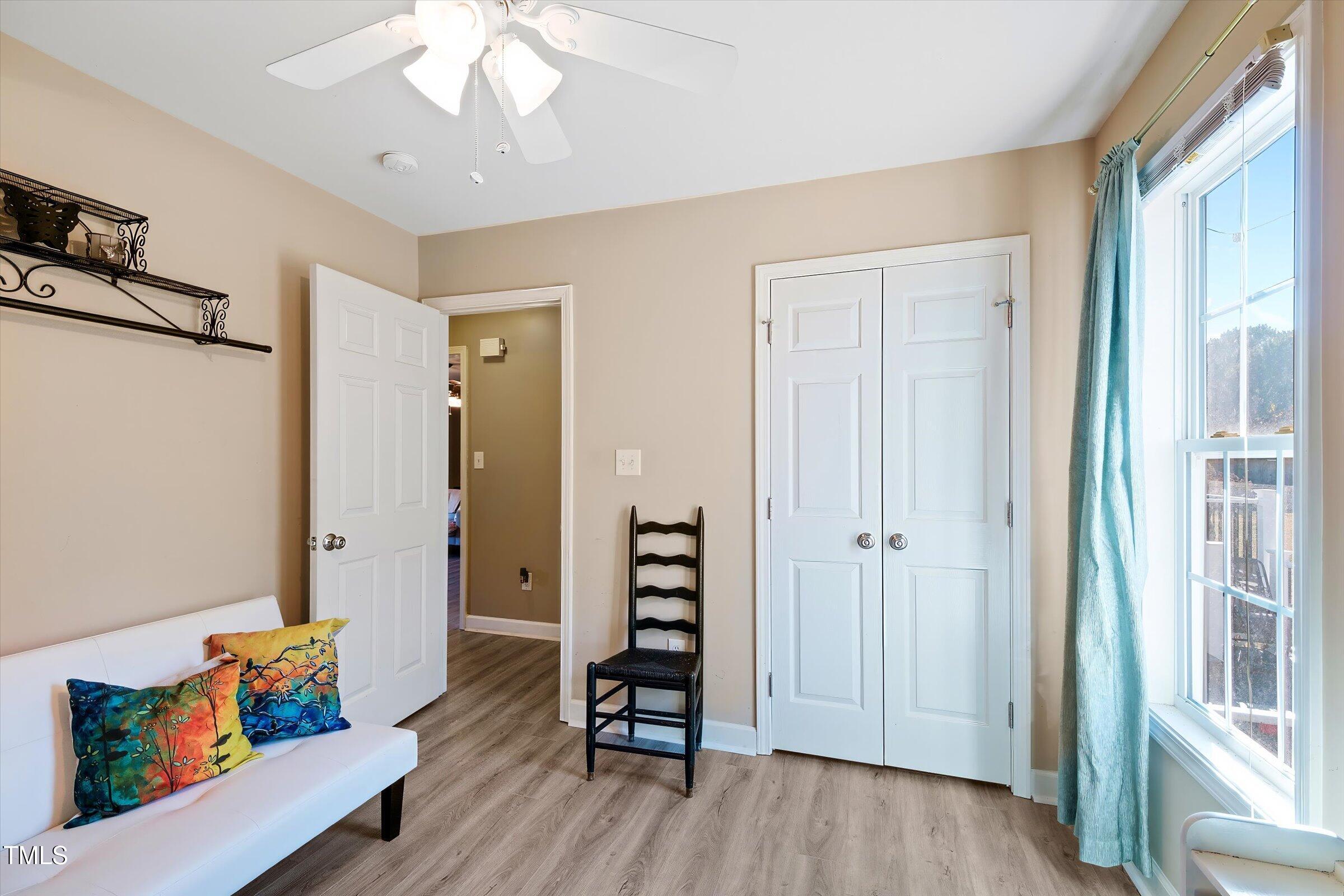 21 Birchwood Circle Coats, NC 27521 - Photo 27 of 36 wooden floor in an empty room with a window