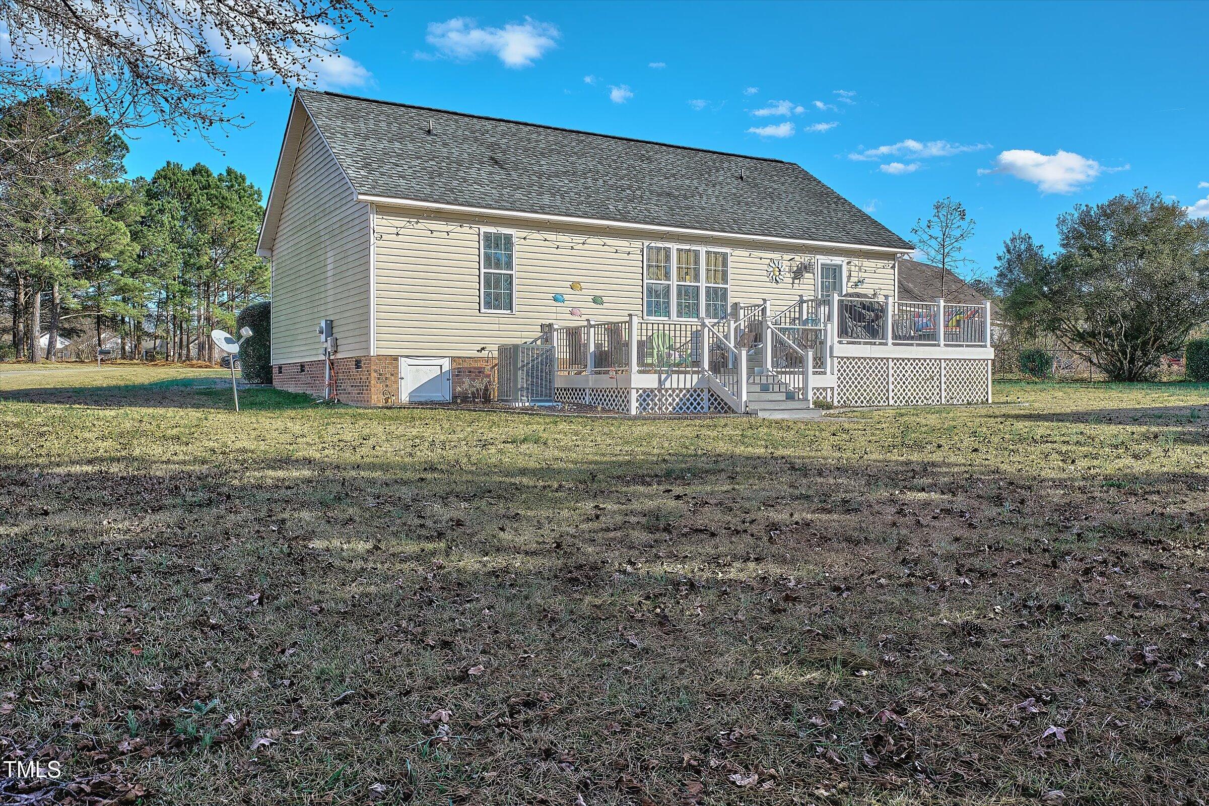 21 Birchwood Circle Coats, NC 27521 - Photo 4 of 36 a view of a house with a yard