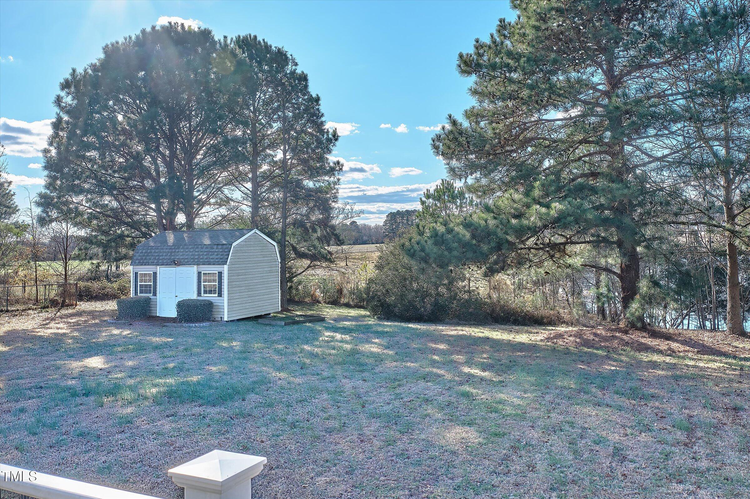 21 Birchwood Circle Coats, NC 27521 - Photo 5 of 36 a view of a house with a yard