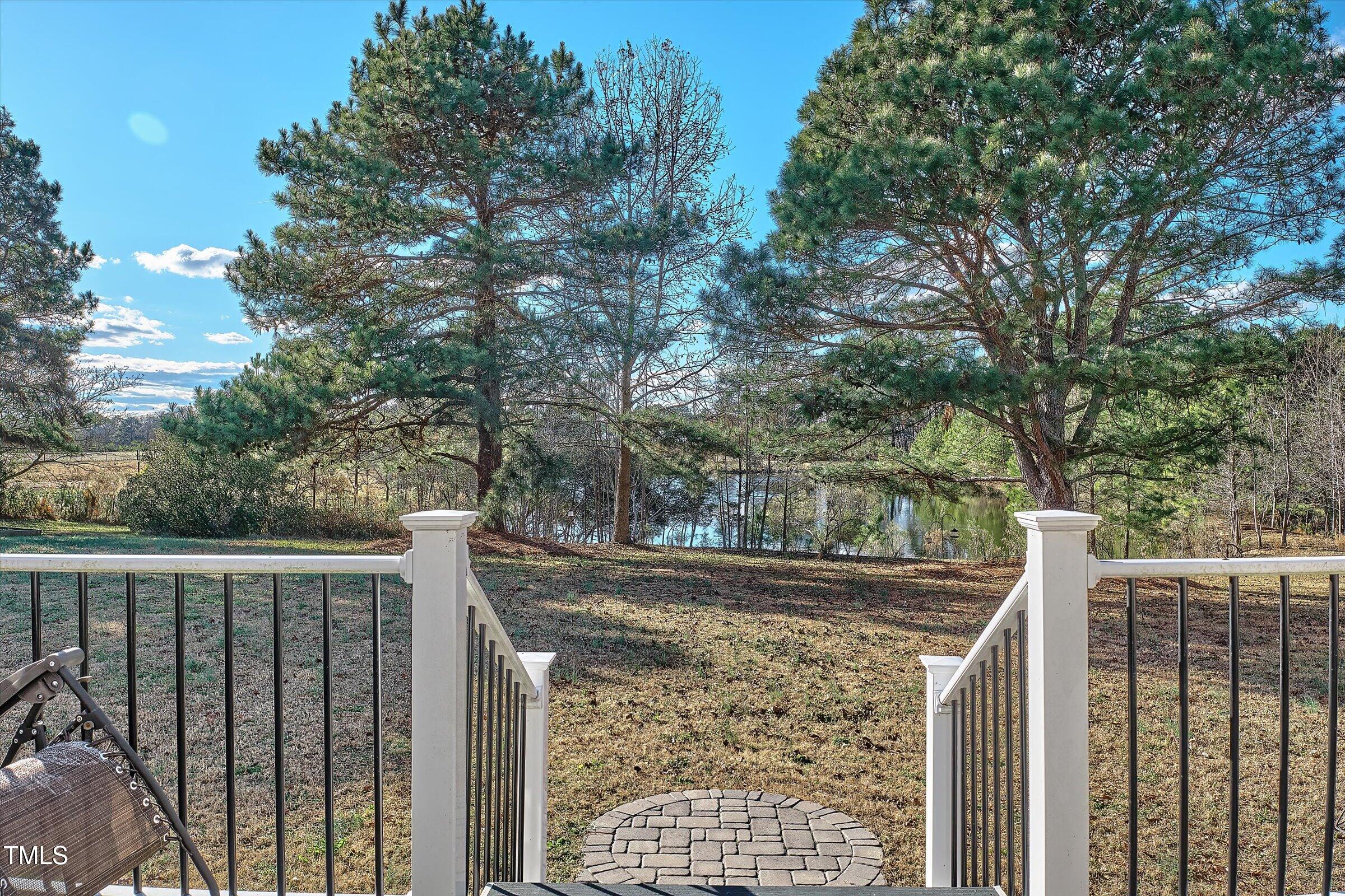 21 Birchwood Circle Coats, NC 27521 - Photo 7 of 36 a view of a wooden fence and trees