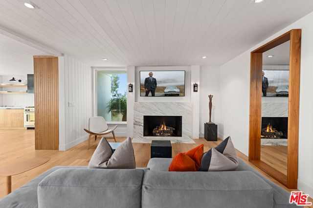 a living room with furniture and a table