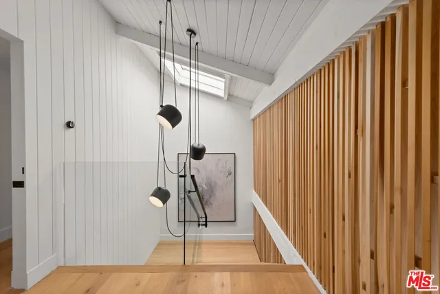 a bedroom with a bed and a fireplace