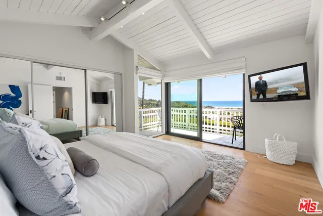 a view of a balcony with city view