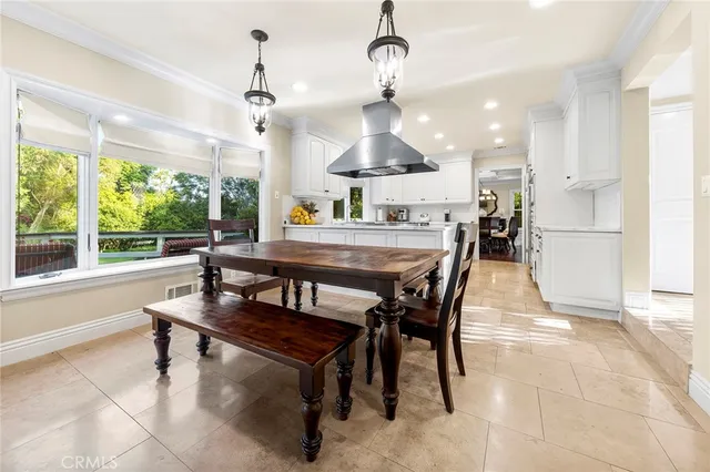 a living room with furniture wooden floor and a fireplace