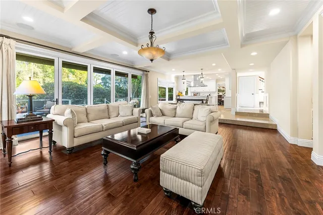 a bed room with a bed and a large window