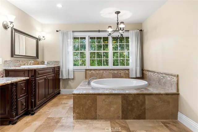 a wooden bench sitting in front of a building