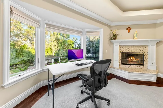 a patio with a patio table and chairs