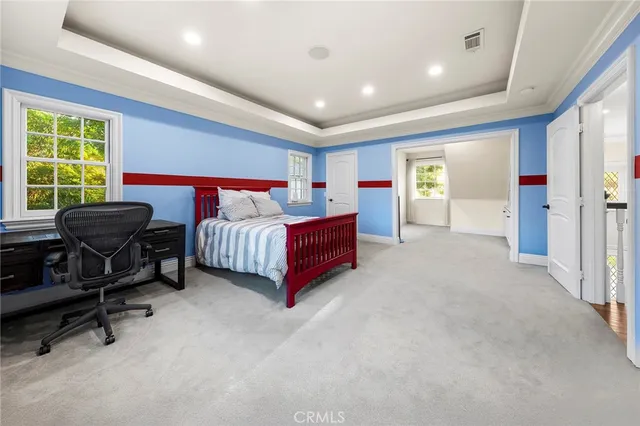 a view of a house with swimming pool and yard