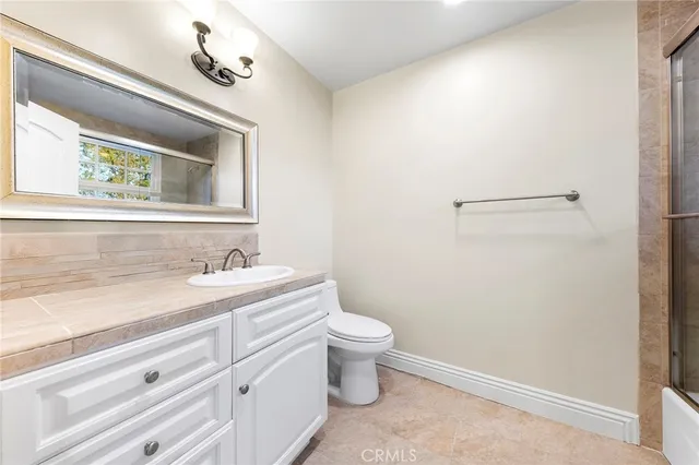 a view of swimming pool with an outdoor space and seating area