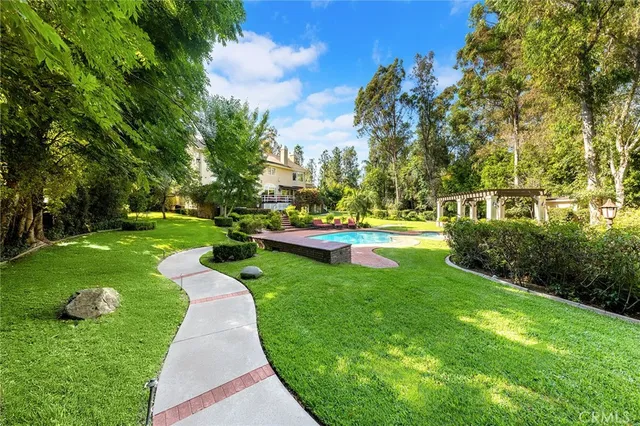an aerial view of residential building with parking space