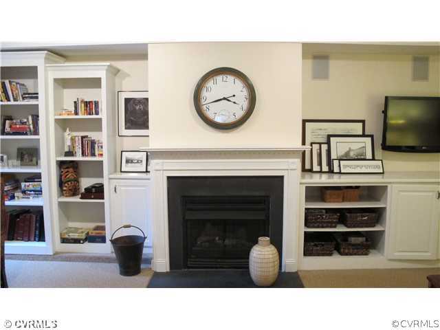 2545 Lochness Road Richmond, VA 23235 - Photo 9 of 20 a living room with furniture and a fireplace
