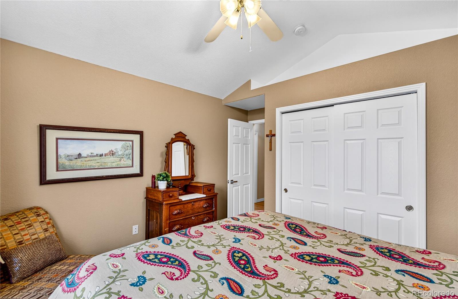 2464 Remington Road Elizabeth, CO 80107 - Photo 11 of 41 a bedroom with a bed and a dresser in it