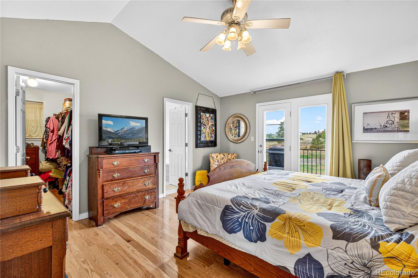 2464 Remington Road Elizabeth, CO 80107 - Photo 16 of 41 a bedroom with a bed and wooden floor
