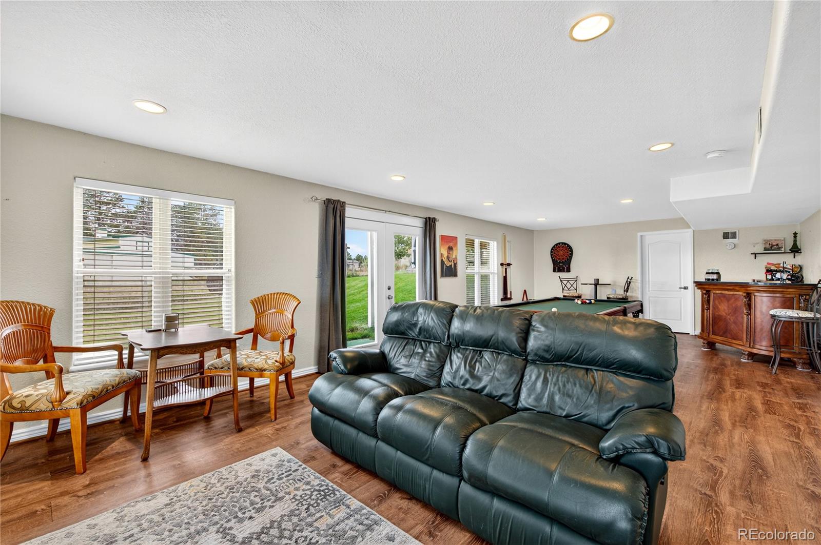 2464 Remington Road Elizabeth, CO 80107 - Photo 24 of 41 a living room with furniture and a window