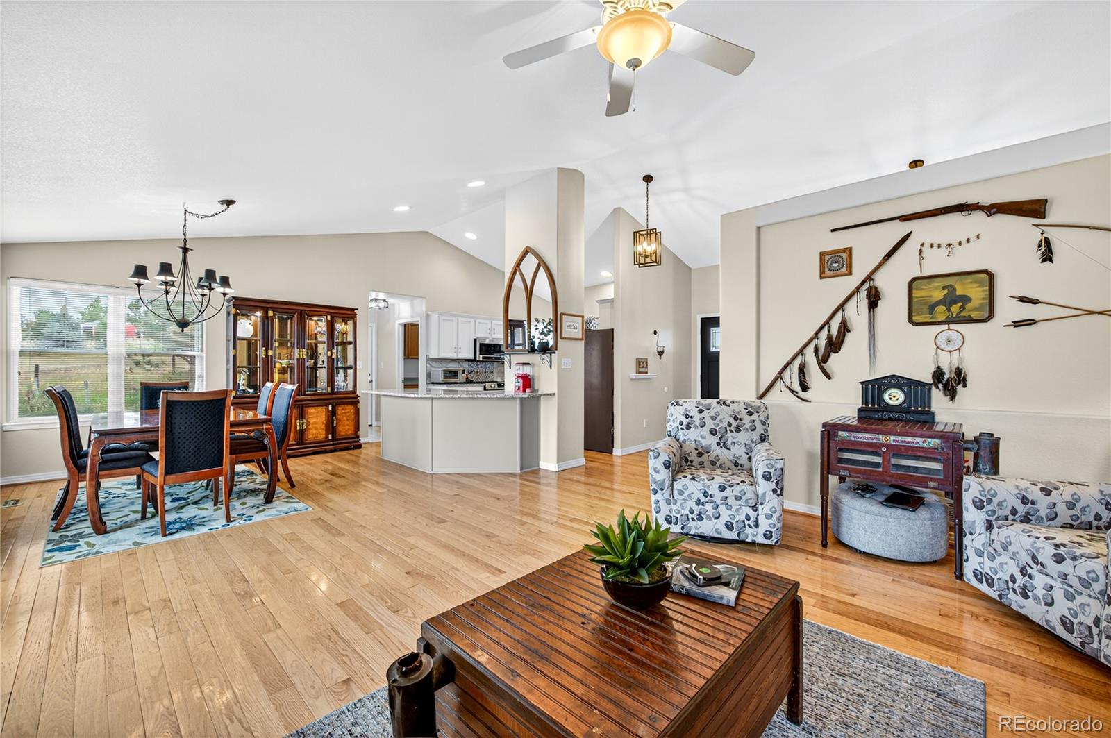 2464 Remington Road Elizabeth, CO 80107 - Photo 3 of 41 a living room with furniture and wooden floor