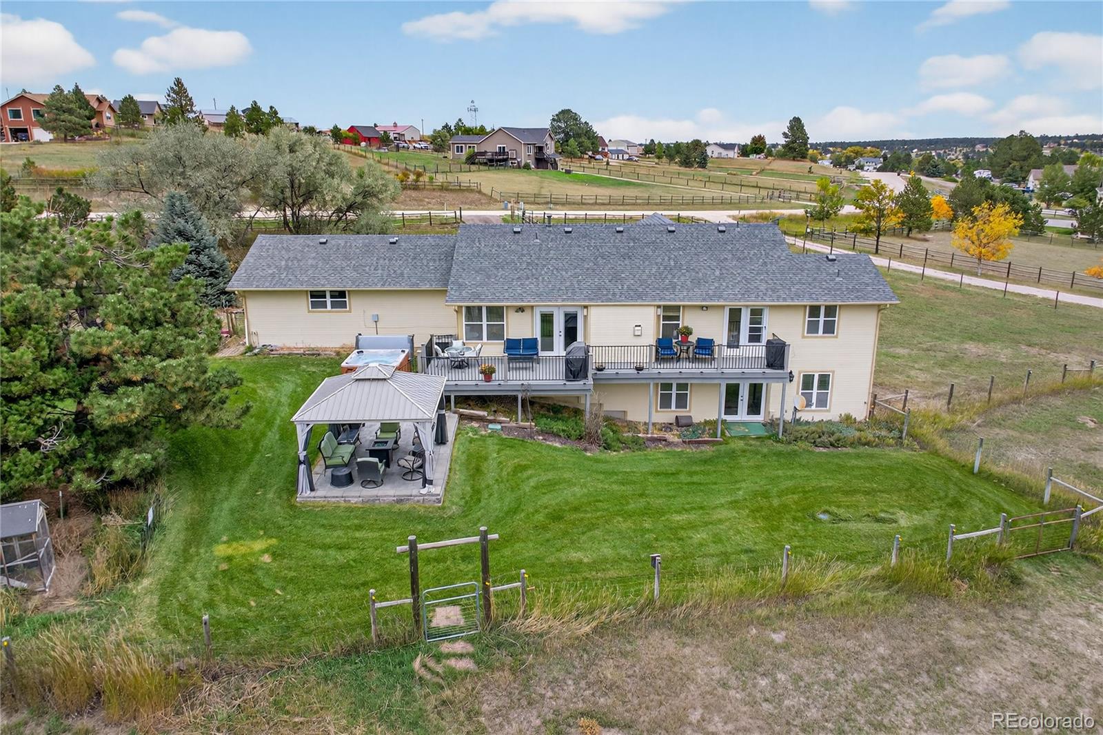 2464 Remington Road Elizabeth, CO 80107 - Photo 40 of 41 an aerial view of a house with a garden
