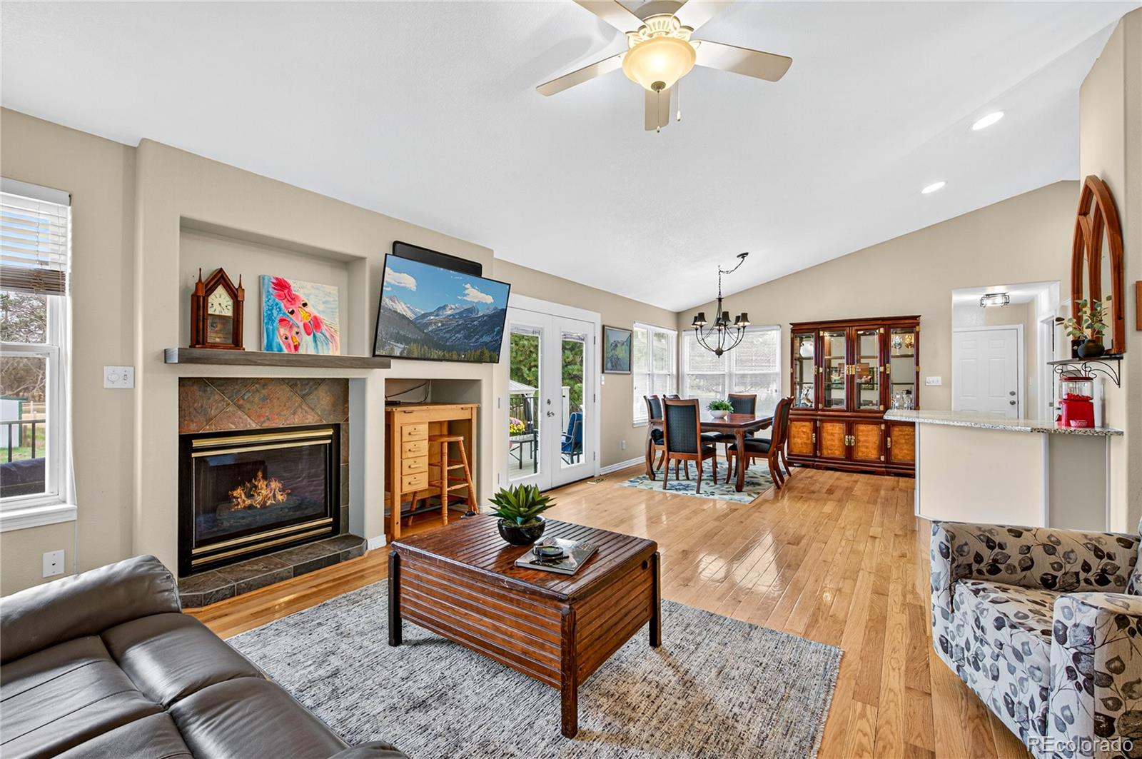 2464 Remington Road Elizabeth, CO 80107 - Photo 4 of 41 a living room with furniture and a fireplace
