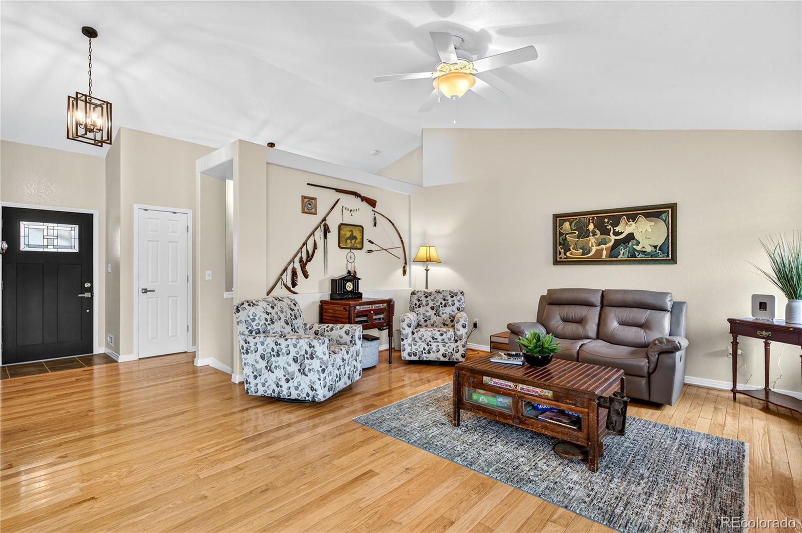 2464 Remington Road Elizabeth, CO 80107 - Photo 5 of 41 a living room with furniture and wooden floor