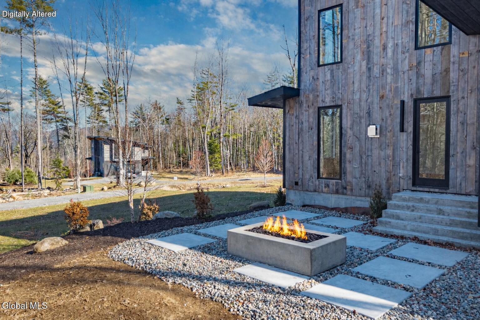 11 South Eagle Ridge Diamond Point, NY 12824 - Photo 8 of 49 Modern house with concrete fire pit