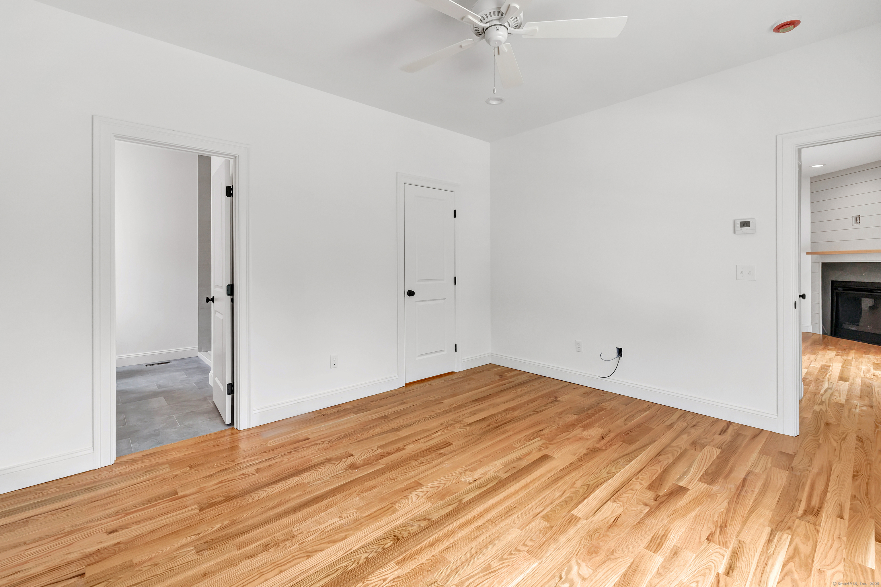 5 Windward Way, Unit 5 Waterford, CT 06385 - Photo 2 of 6 a view of empty room with wooden floor