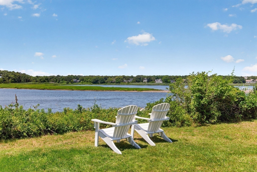 50 Pine Ridge Road Chatham, MA 02633 - Photo 42 of 42 a view of a chairs and table on the terrace