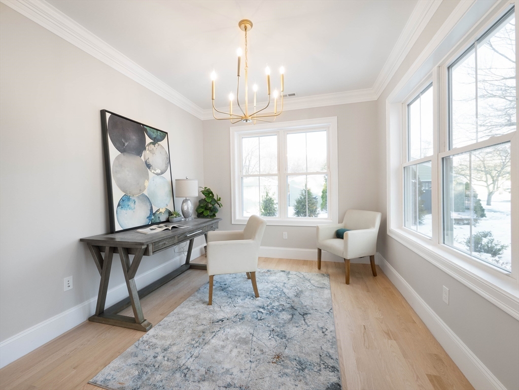 22 Bradford Road Natick, MA 01760 - Photo 12 of 37 a living room with furniture and a window