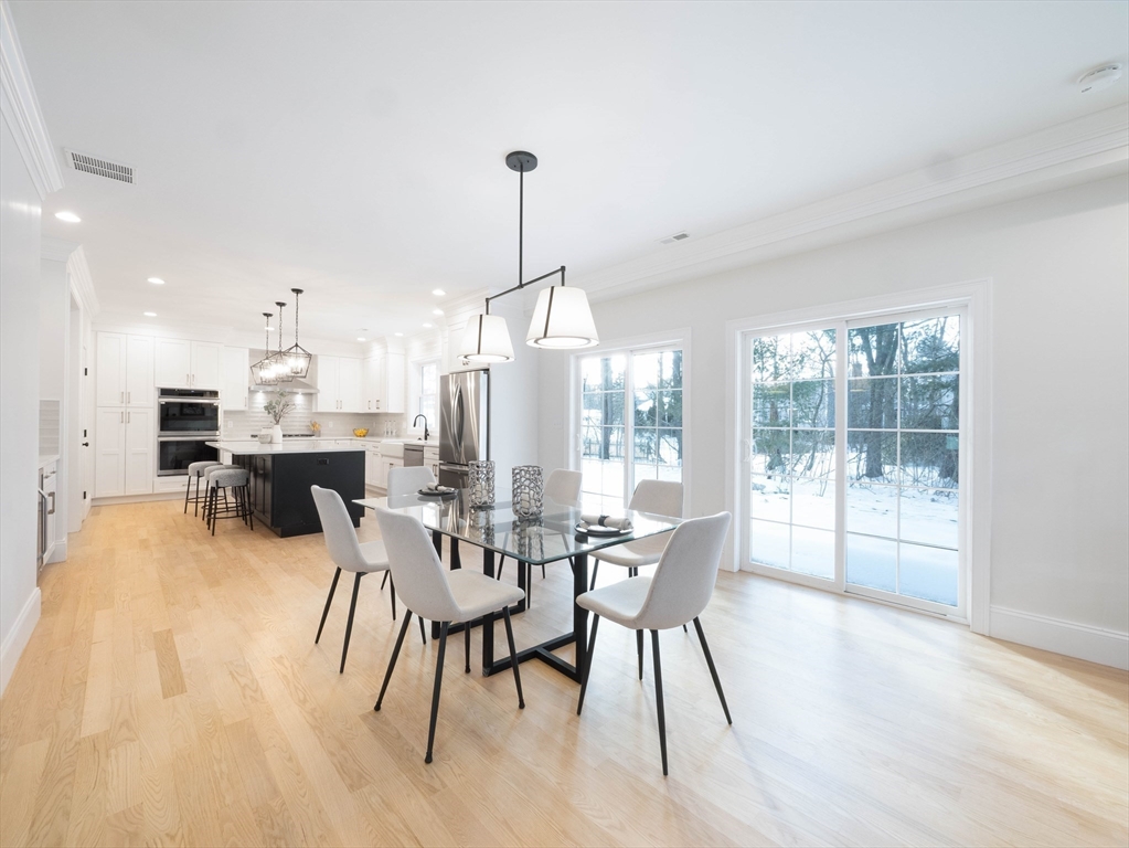 22 Bradford Road Natick, MA 01760 - Photo 8 of 37 a view of a dining room with furniture window and outside view