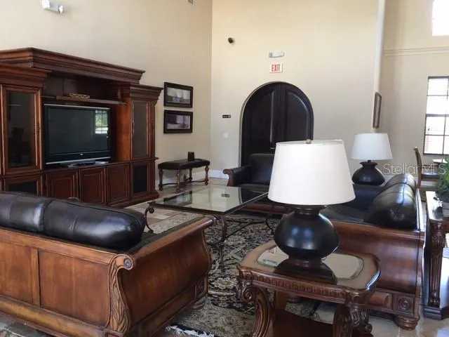 a view of a lake with houses in the back