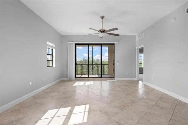 a view of an empty room with a window