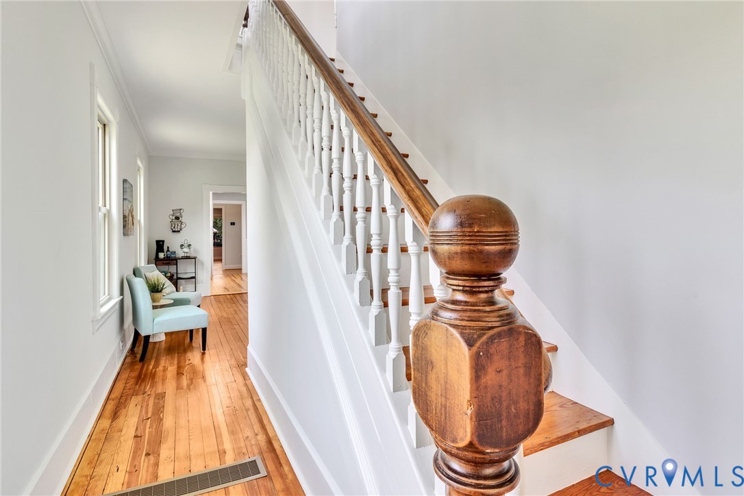 618 Main Street Reedville, VA 22539 - Photo 6 of 54 Wood-finish flooring extending from the hallway in