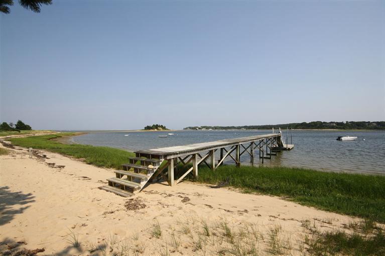 58 Old Salt Works Road Chatham, MA 02633 - Photo 4 of 15 a view of a lake with a beach