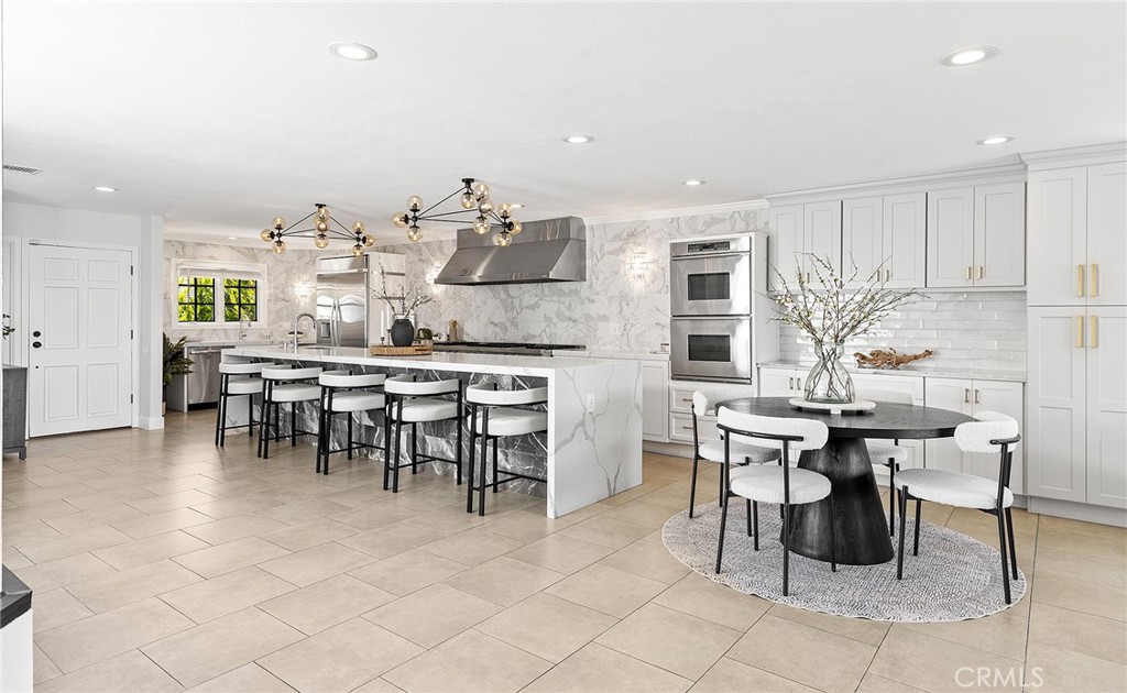 23966 Wanigan Way Laguna Niguel, CA 92677 - Photo 13 of 57 a view of a dining room with furniture