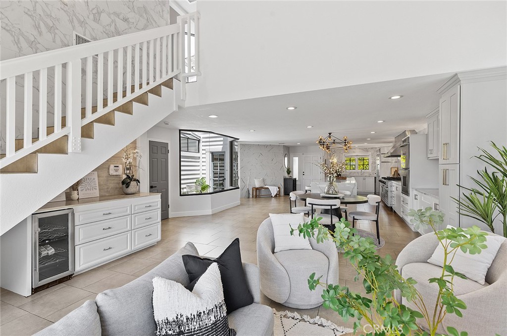 23966 Wanigan Way Laguna Niguel, CA 92677 - Photo 17 of 57 a living room with furniture cabinets and a window