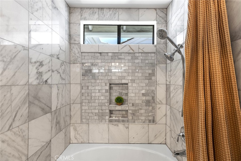 23966 Wanigan Way Laguna Niguel, CA 92677 - Photo 35 of 57 a bathroom with a shower