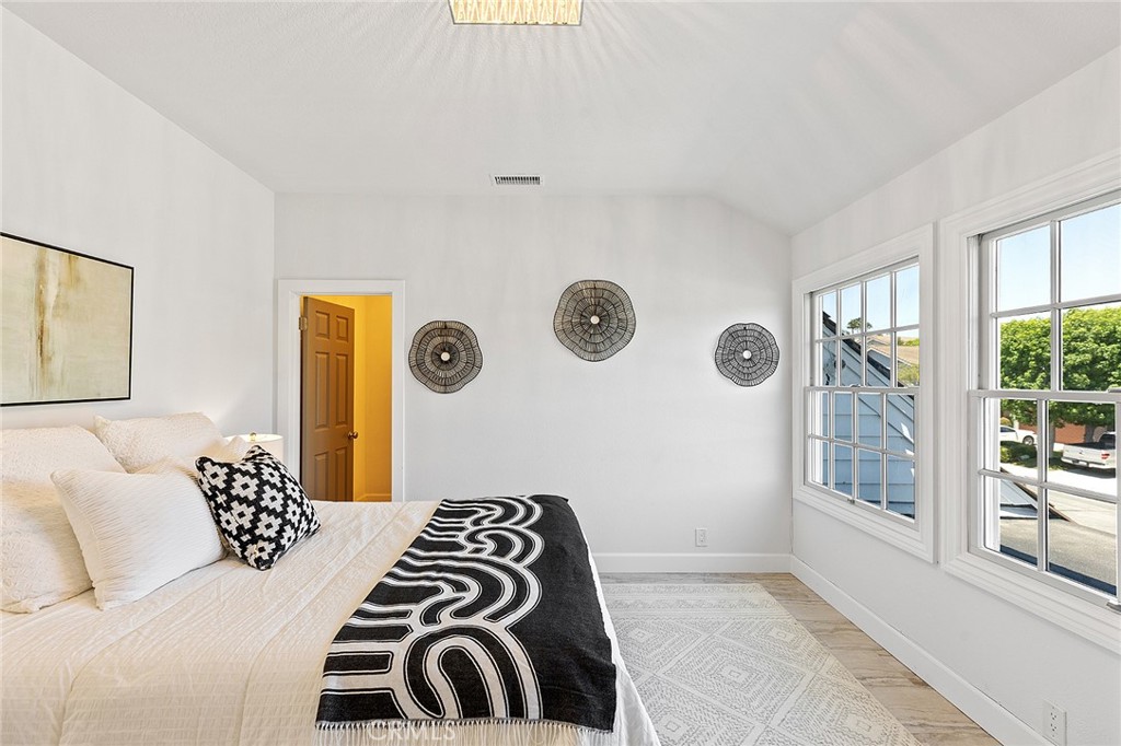 23966 Wanigan Way Laguna Niguel, CA 92677 - Photo 41 of 57 a bedroom with a bed and a window