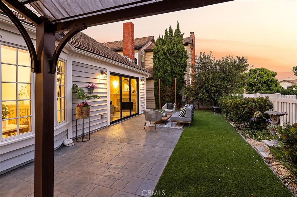 23966 Wanigan Way Laguna Niguel, CA 92677 - Photo 53 of 57 a view of a porch with furniture and garden