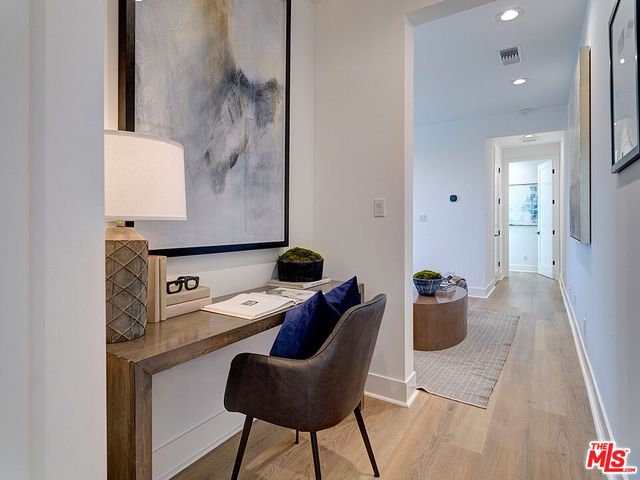 a workspace with furniture and rug