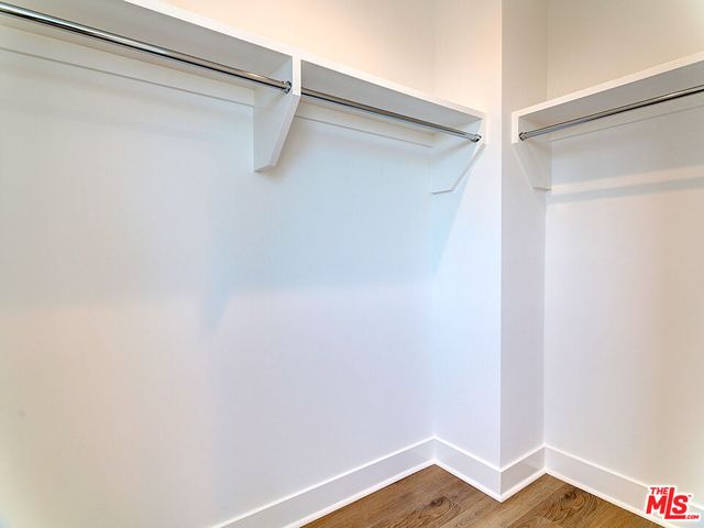 a view of a store room with wooden floor