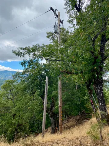 a view of a lake with a yard
