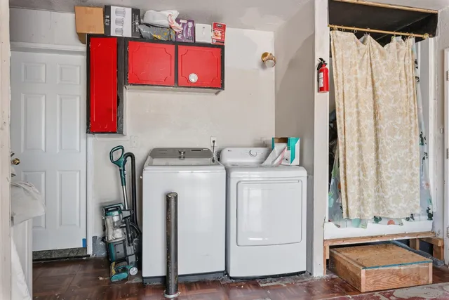 a utility room with dryer and washer