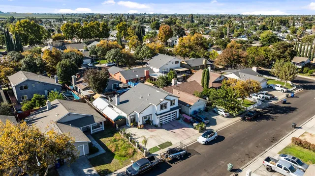 an aerial view of a city with lots of residential buildings