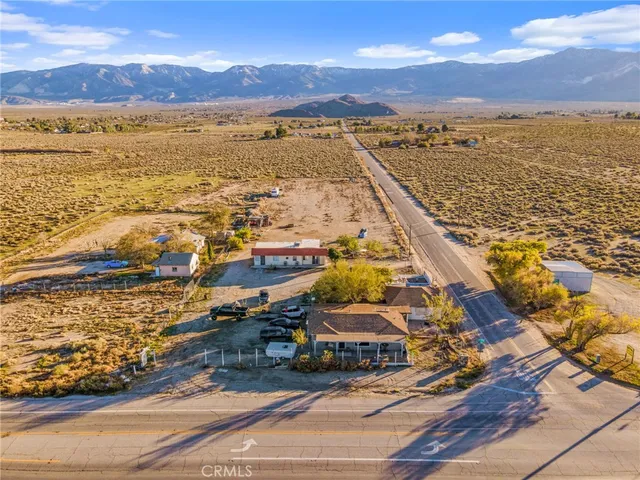 an aerial view of residential building and ocean view