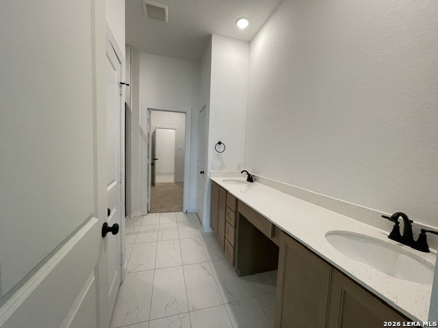 9431 Hidden Stone Schertz, TX 78154 - Photo 13 of 30 a bathroom with a sink and a mirror
