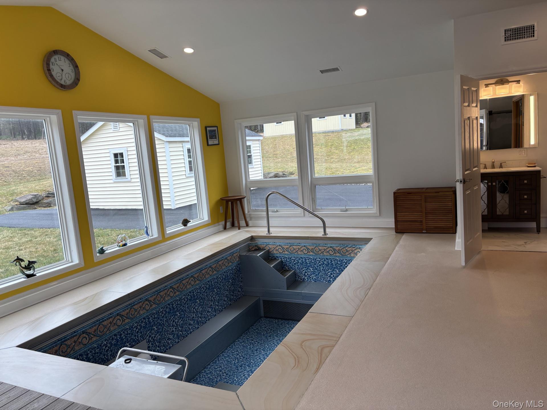 657 Sackett Lake Road Monticello, NY 12701 - Photo 27 of 36 a living room with furniture and large windows