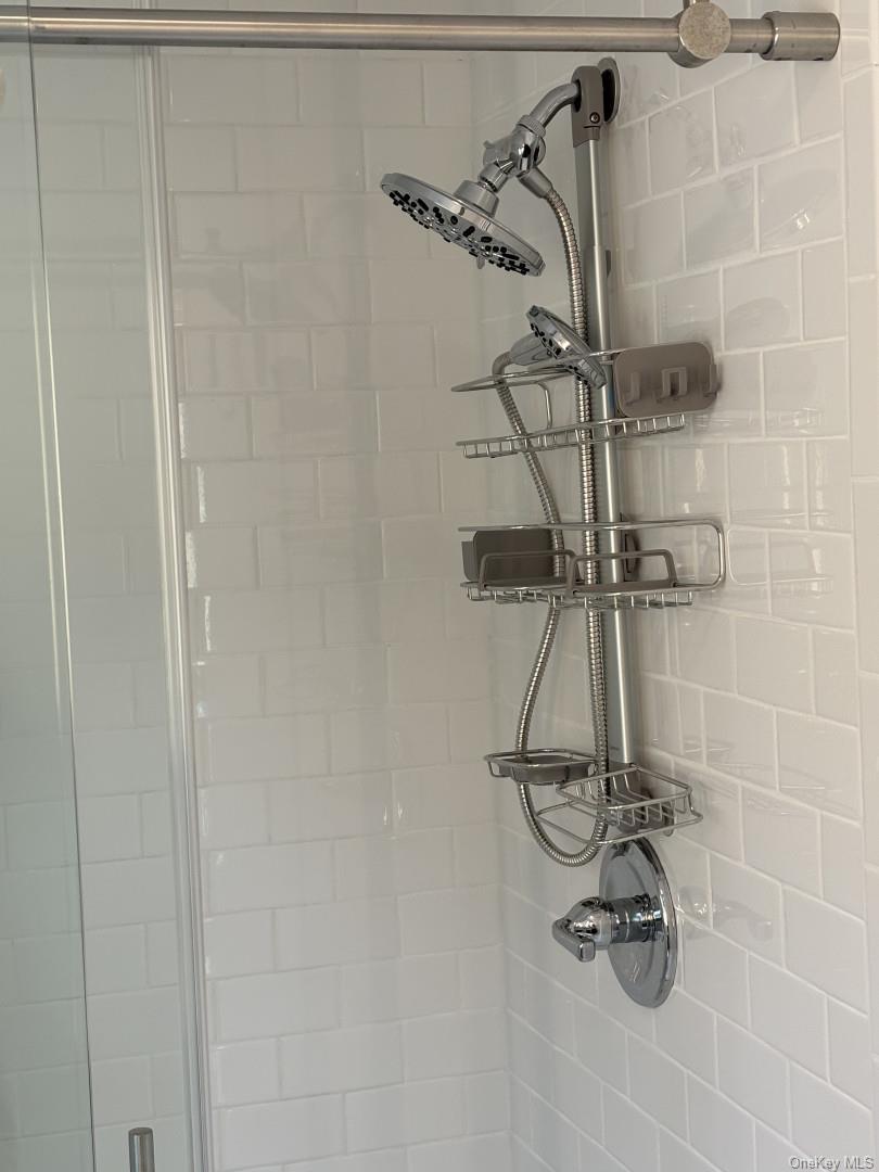 657 Sackett Lake Road Monticello, NY 12701 - Photo 28 of 36 a bathroom with a shower