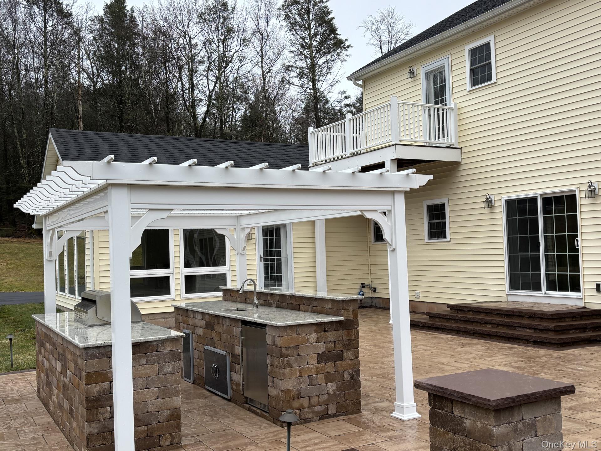 657 Sackett Lake Road Monticello, NY 12701 - Photo 32 of 36 a front view of house with a garden