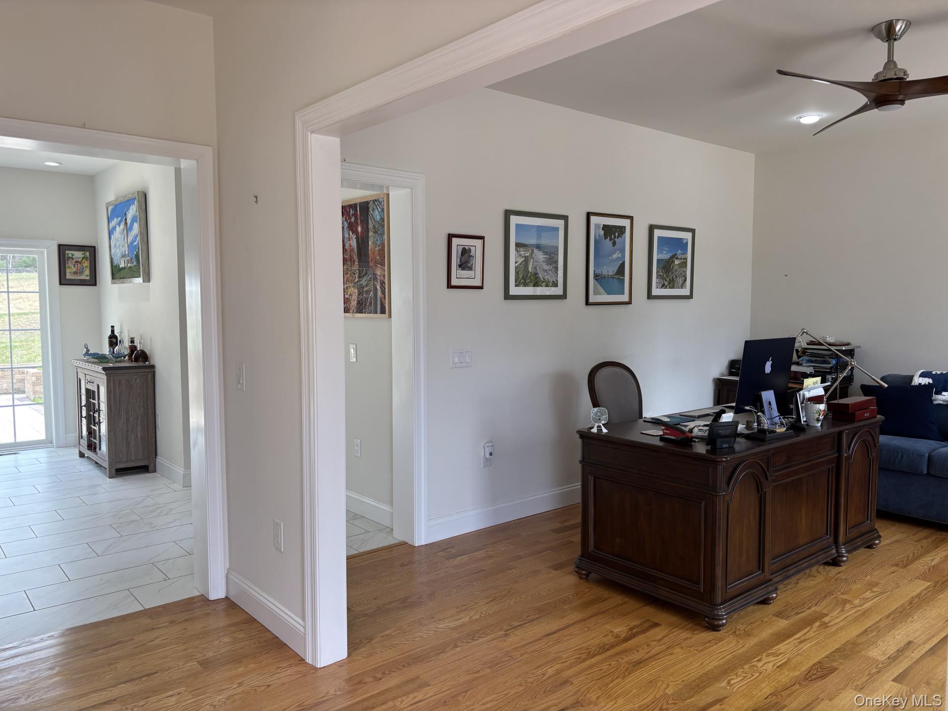657 Sackett Lake Road Monticello, NY 12701 - Photo 10 of 36 a living room with furniture and wooden floor