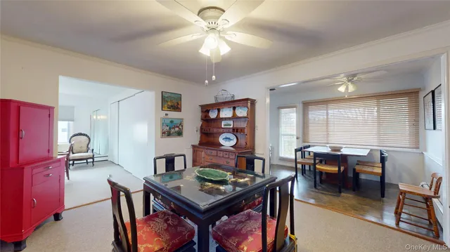 a large kitchen with kitchen island a sink stainless steel appliances and cabinets